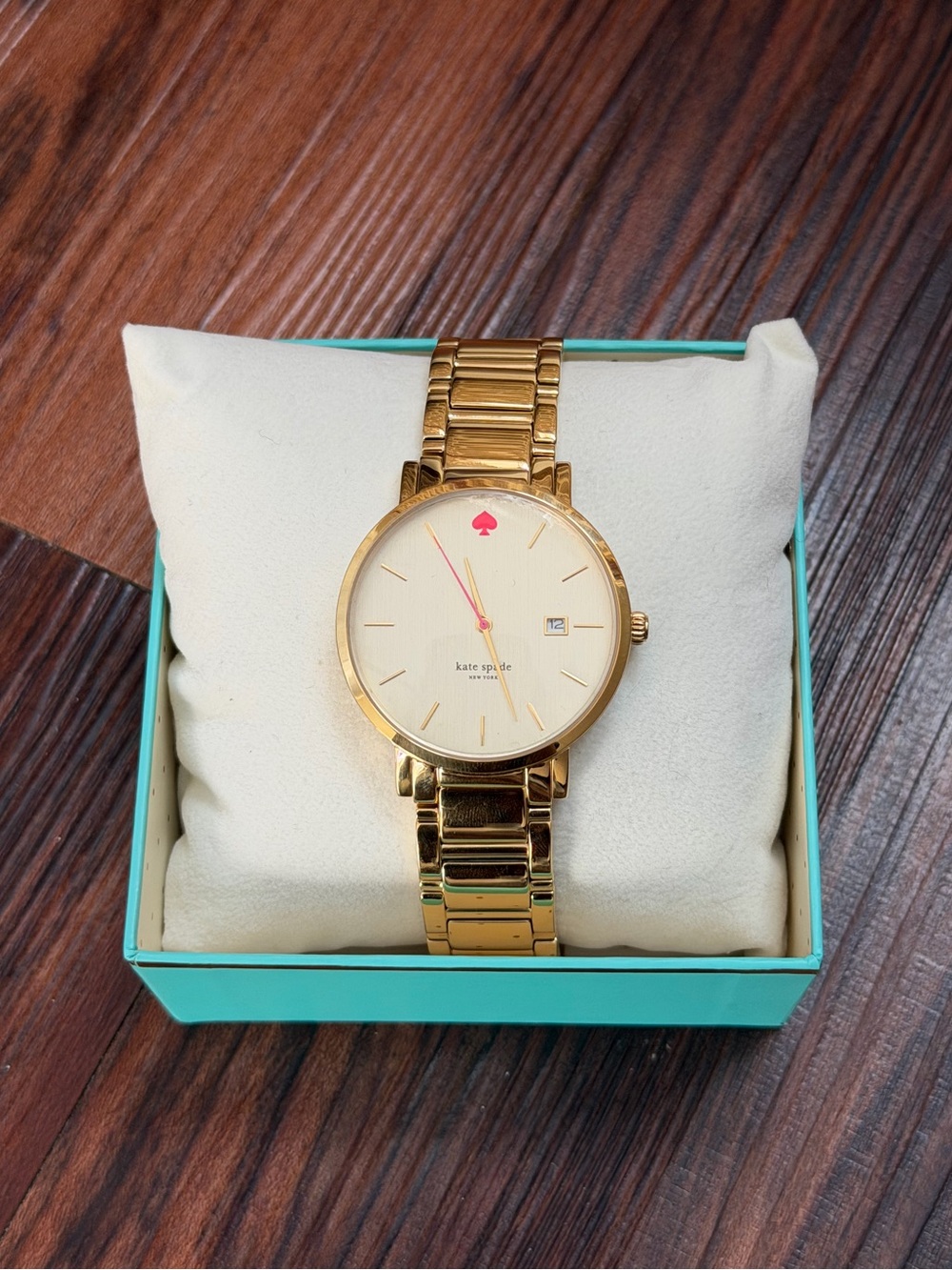 kate spade gold toned womens watch with pink accents